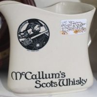 C1920's Royal Doulton McCallum's Scots Whisky Jug